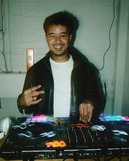 Ryan behind the DJ decks